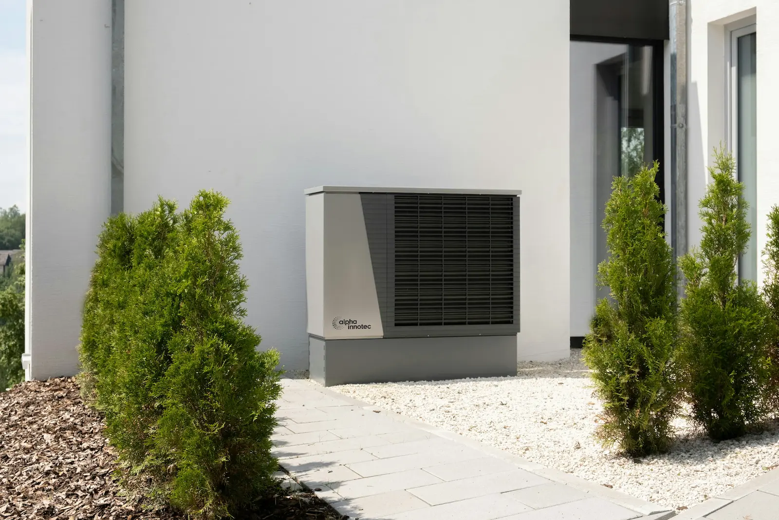 Emergency AC repair technician servicing HVAC system at night